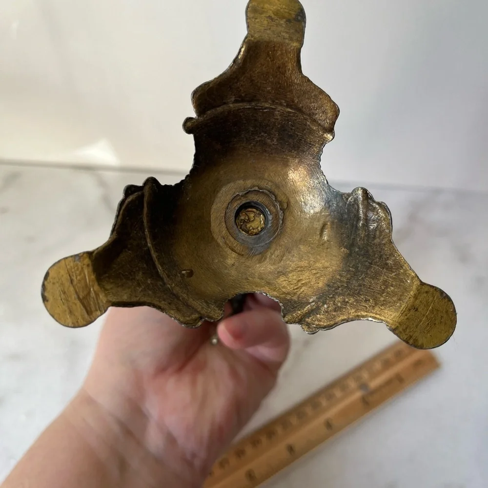 Antique cherub figurine candle holder